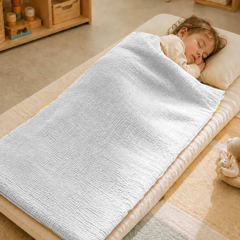 sac couchage enfant en coton blanc